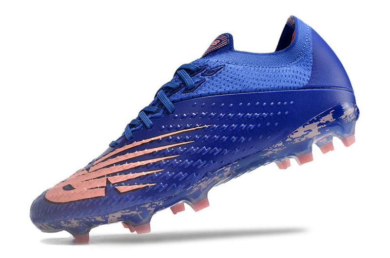 Chuteira New Balance Vivid Spark FG
